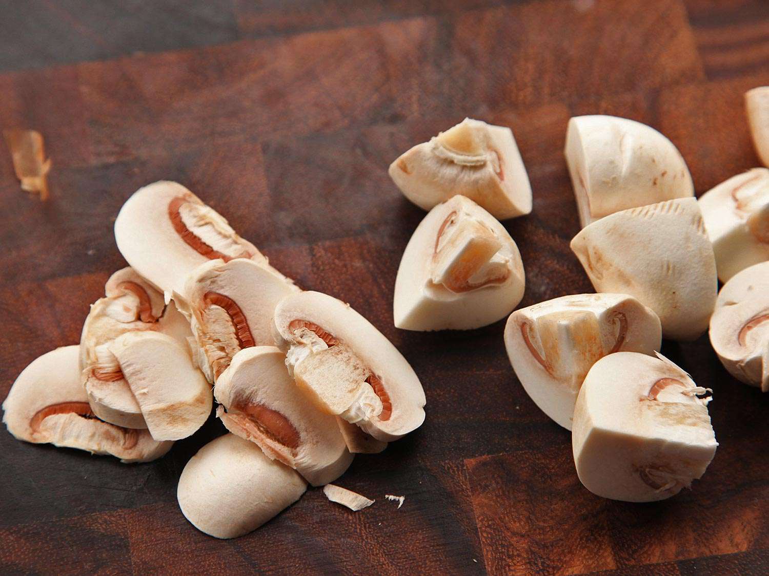 Chopped mushroom on a cutting board.