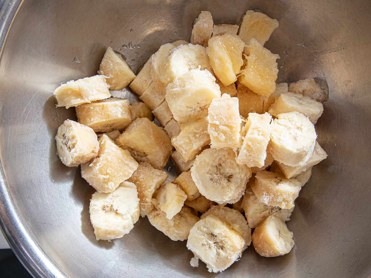 Overhead view of sliced frozen bananas