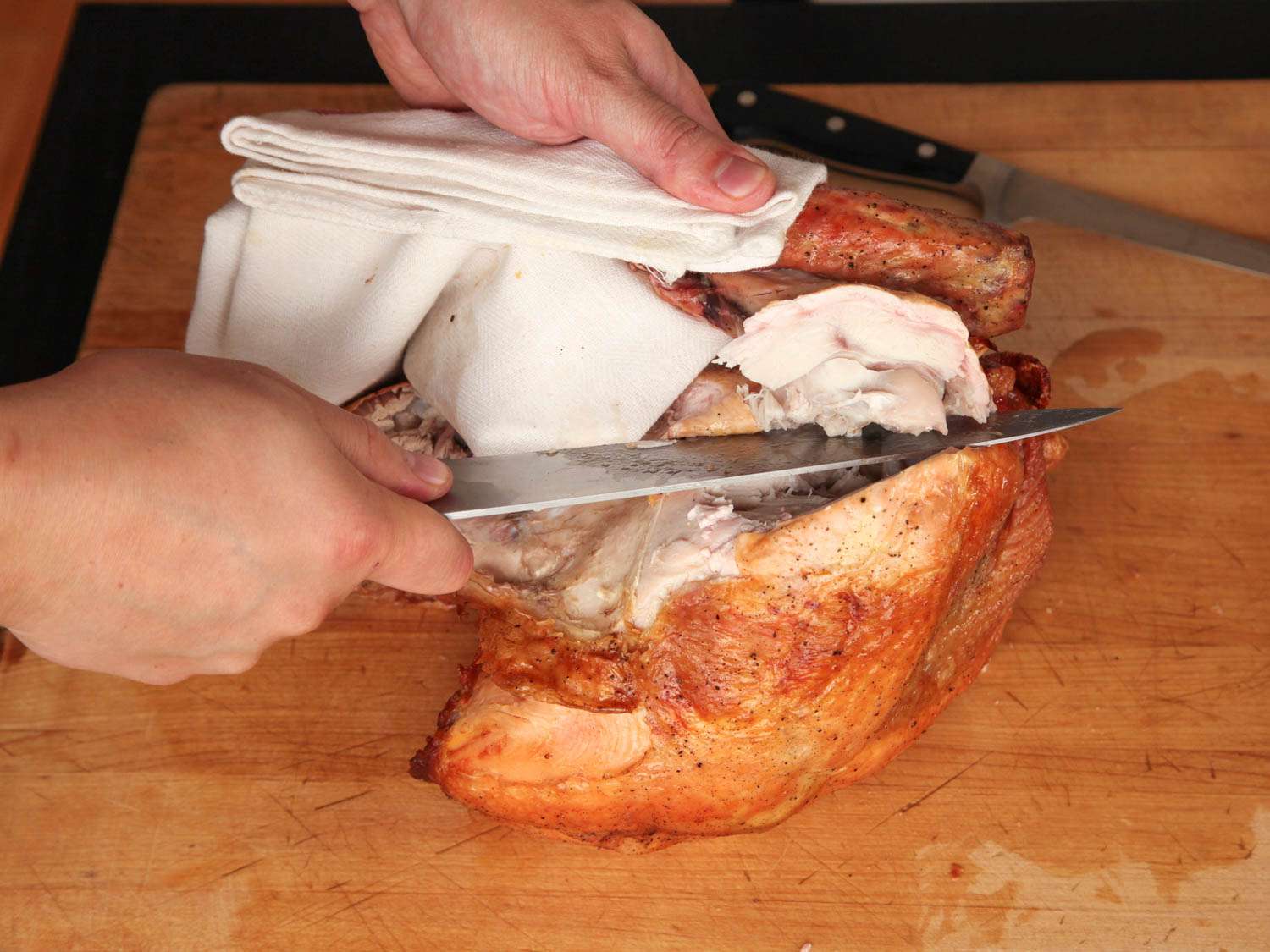 carving a roasted turkey