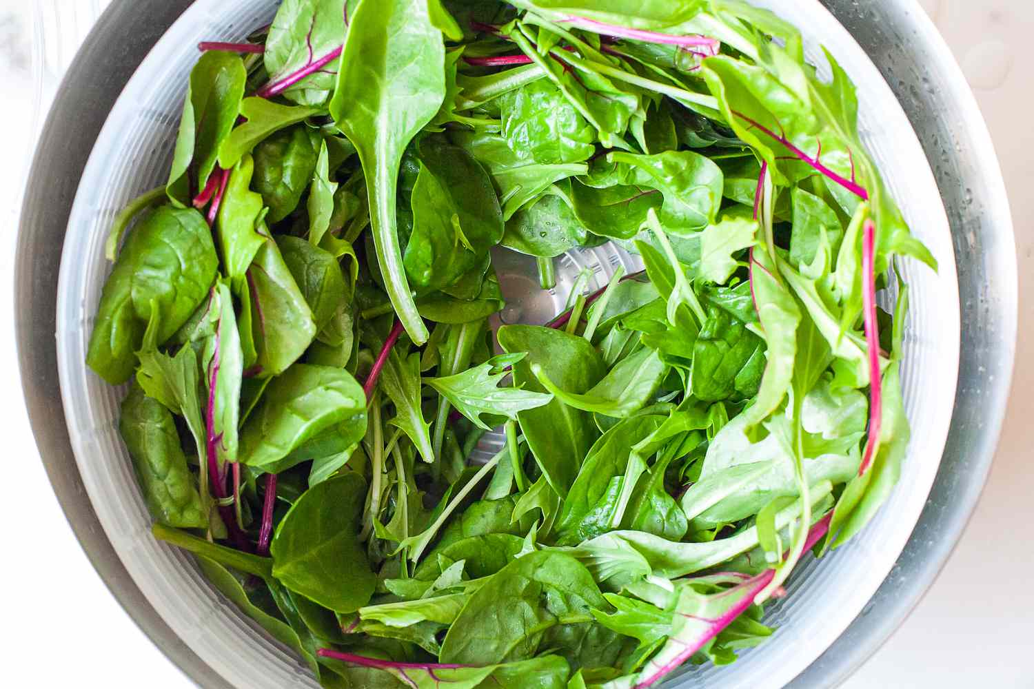 greens in the salad spinner