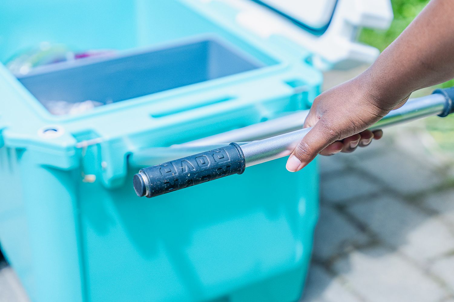 Pulling handlebar on the Rovr RollR 60 Wheeled Cooler