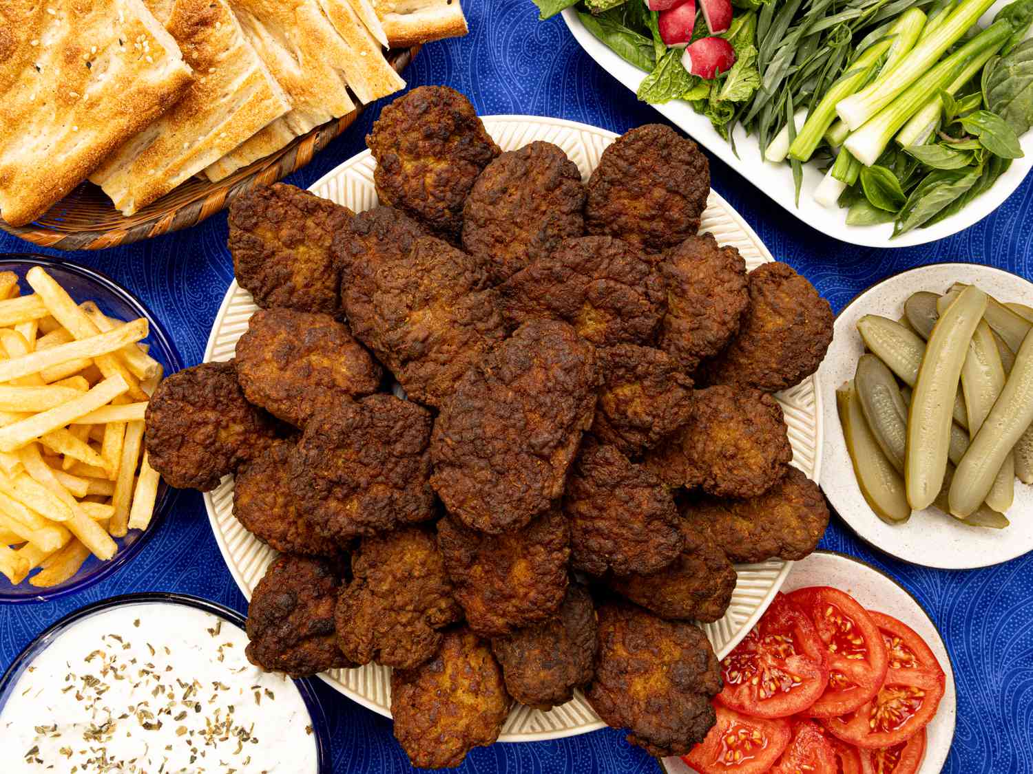 Overhead view of kotlet with different side dishes