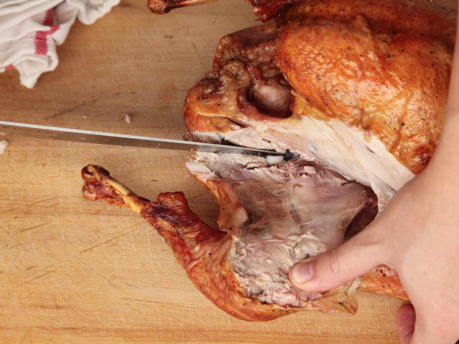 carving a roasted turkey