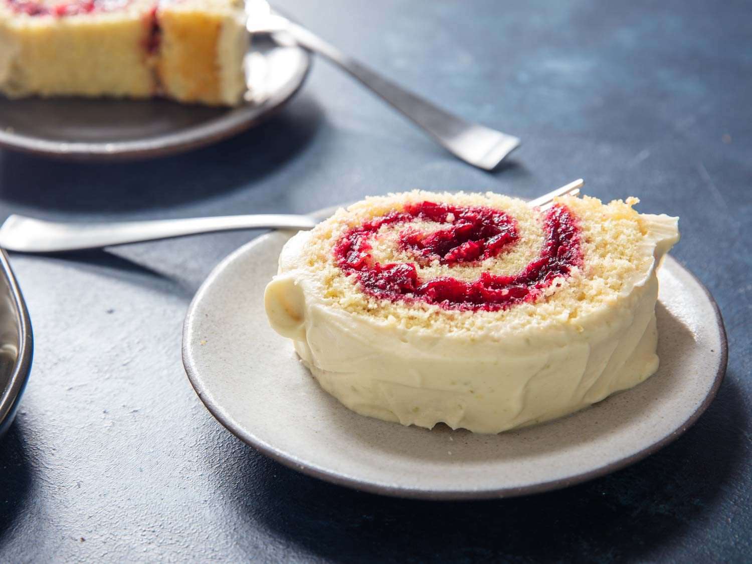 Cross-section of a sliced of frosted portion of jelly roll