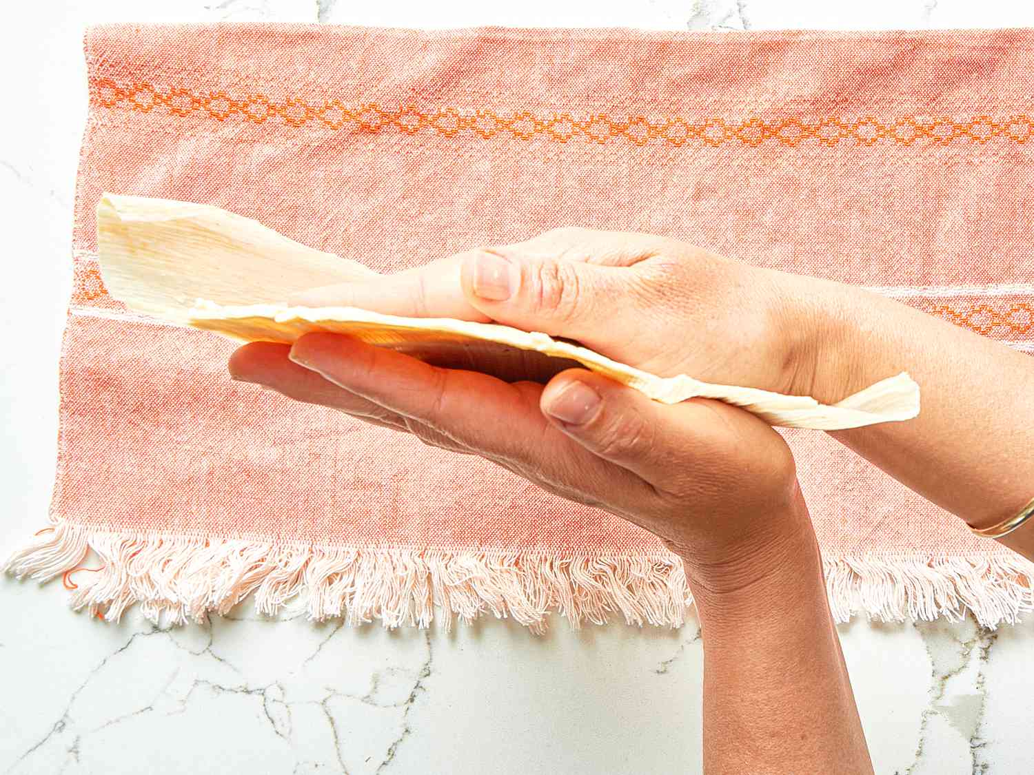 Overhead view of thin filling of tamale