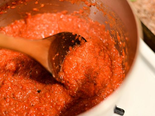 Ajvar simmering on the stove. 