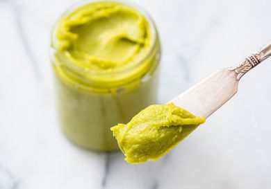 A jar of homemade pistachio paste. 