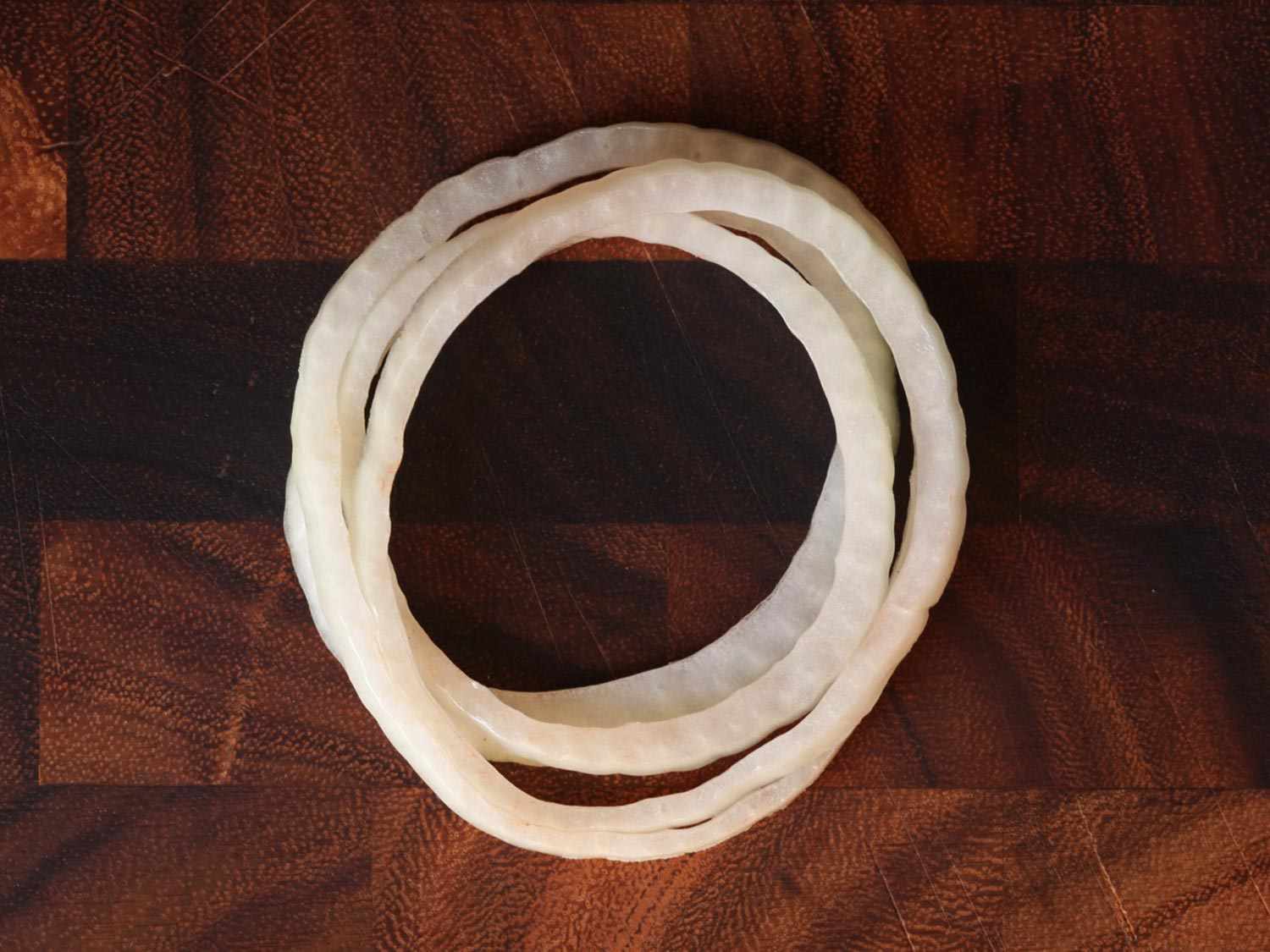 Several rings of sliced onion, as harvested from a Whopper.