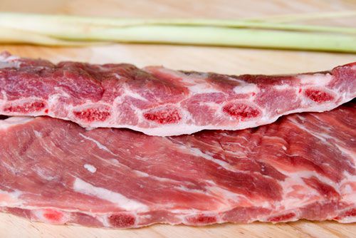 The cross-section of raw pork spareribs 