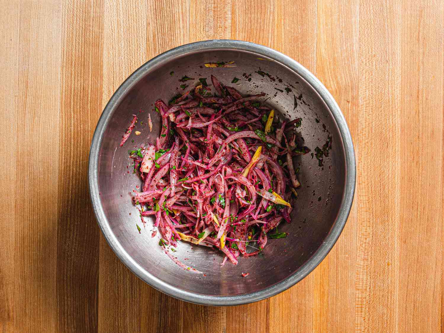 Optional salad topping assembled in silver bowl