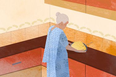 An illustration of Ajji in the kitchen, picking up a platter piled high with food.