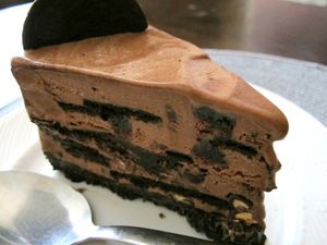 A slice of famous wafer chocolate ice cream cake served on a plate.