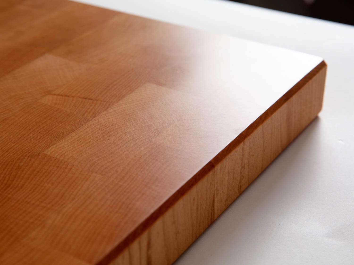 The fine finish on Brooklyn Butcher Block's woodwork, showing how light shines off the incredibly smooth surface.