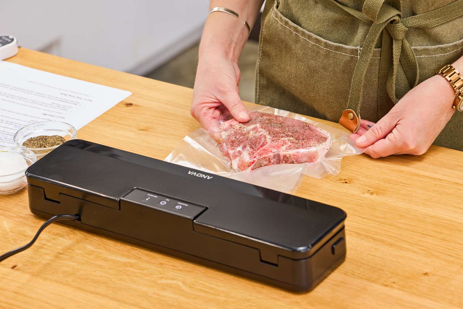 A bag of meat is vacuum seal using the Anova Precision Sous Vide Vacuum Sealer