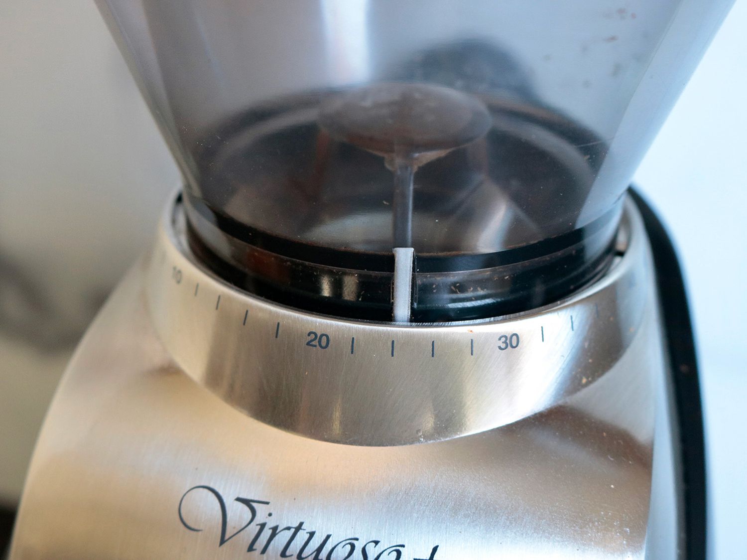 a close up of a grind adjustment dial on a coffee grinder