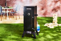 A staged shot of the Cuisinart COS-244 Vertical Propane Smoker
