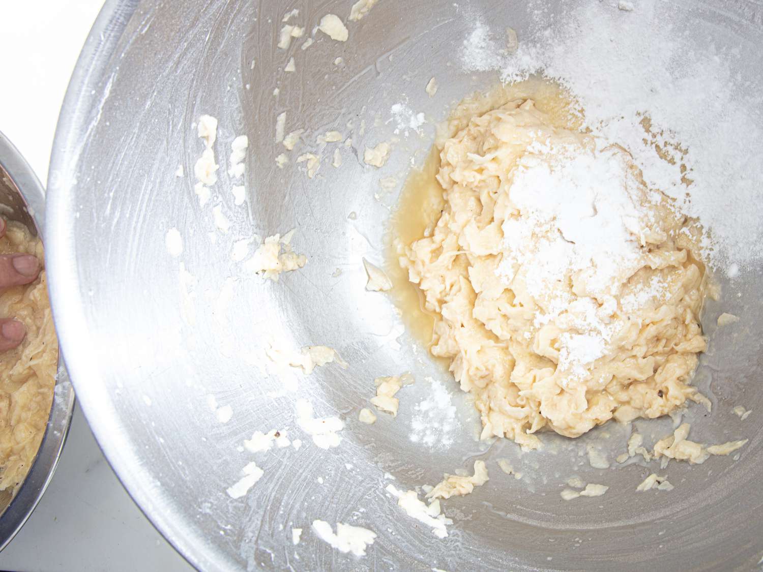 Overhead view of adding potato starch