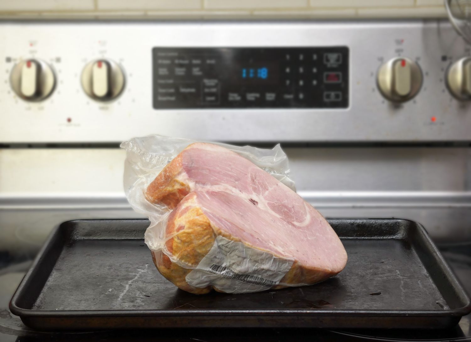 zingermans ham on a sheet tray on the stove