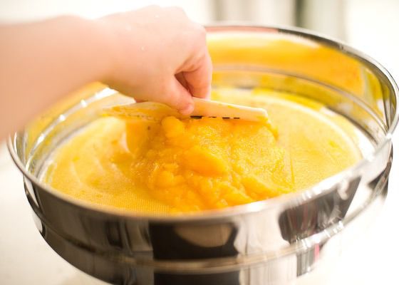 Press through a sieve or tamis