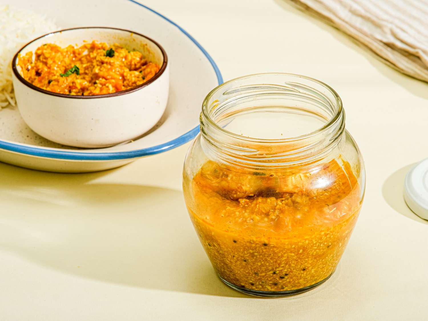 Side view of kadhkhadi in a jar