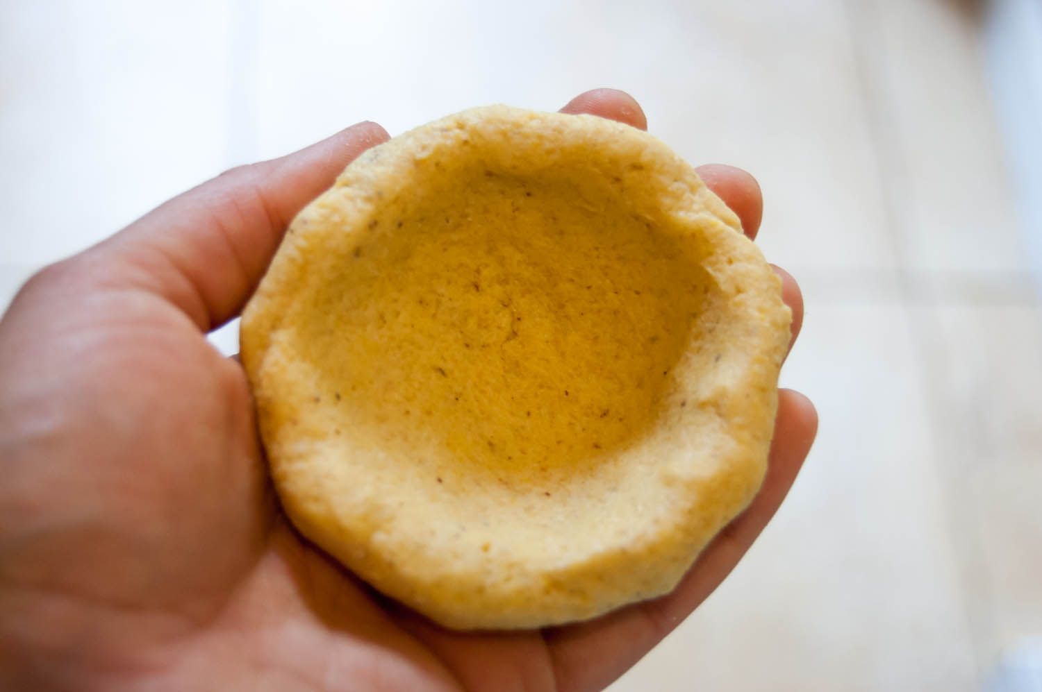 Masa dough formed into cup shape.