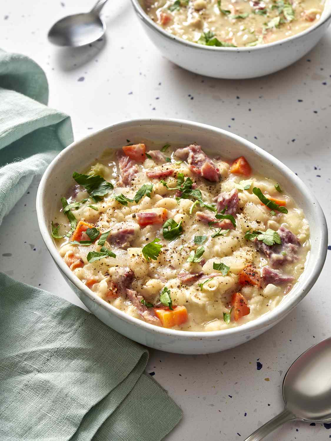 Ham & bean soup in a ceramic bowl.
