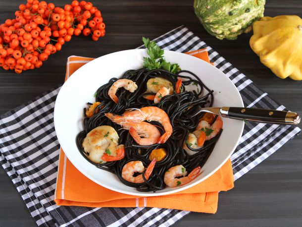 The finished squid ink pasta, tossed with the white wine sauce and seafood.