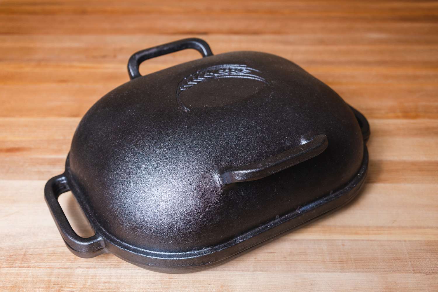 The Challenger bread oven on a wooden surface