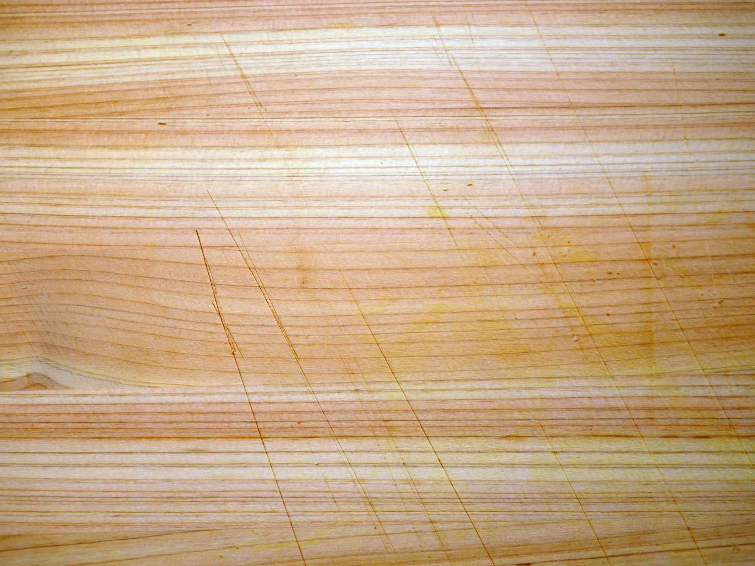 gouges and stains on an edge-grain cutting board