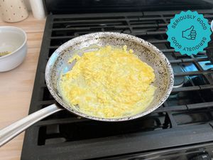 the all-clad D5 skillet with scrambled eggs inside it