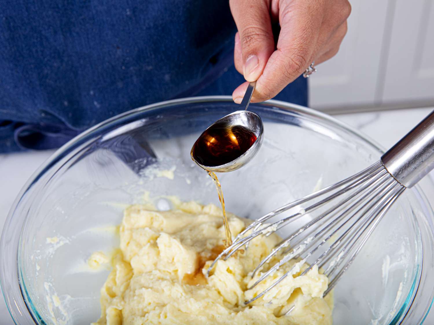 Vanilla being added to pastry cream