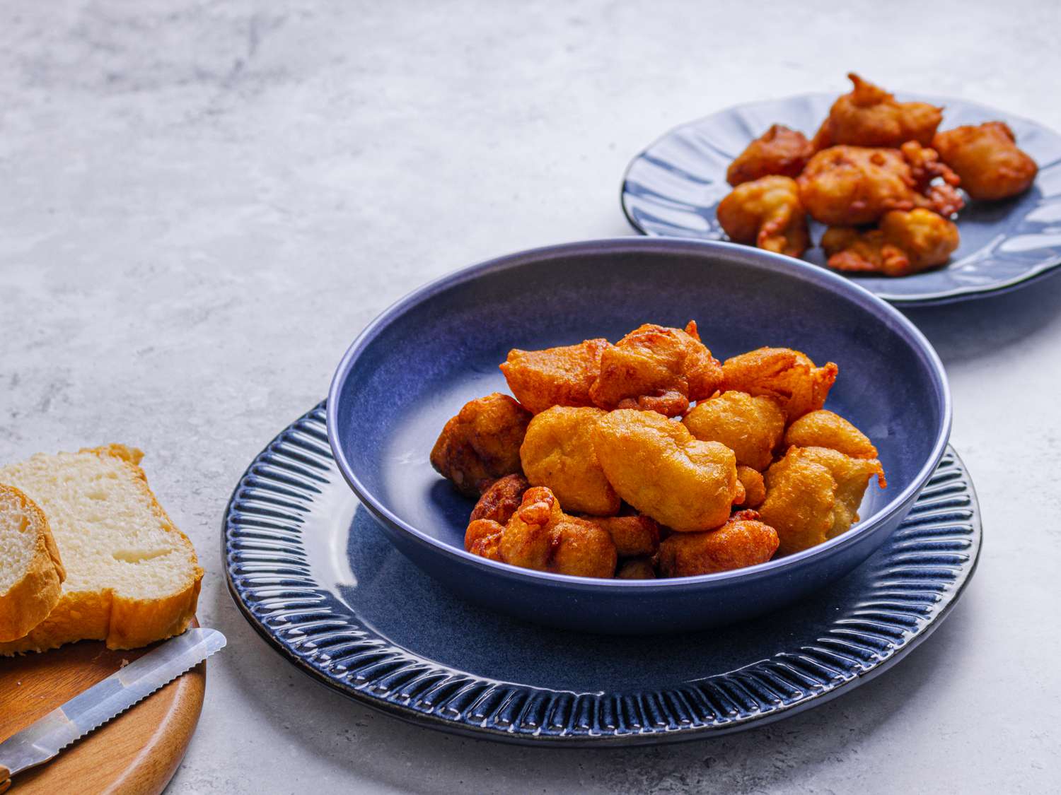 Side view of akara in a blue bowl