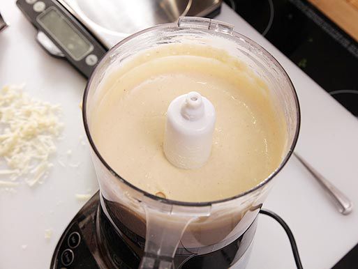 Caesar dressing in a food processor, smooth and creamy.