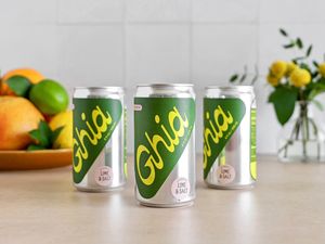 Ghia Lime & Salt Le Spritz cans on counter