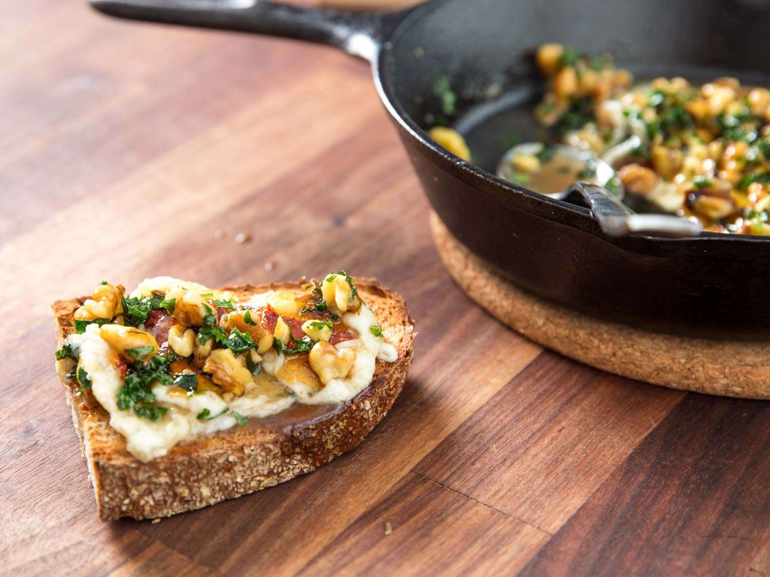 Saganaki with walnut vinaigrette on crusty bread