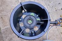 The PowerFlamer outdoor wok burner on a patio.