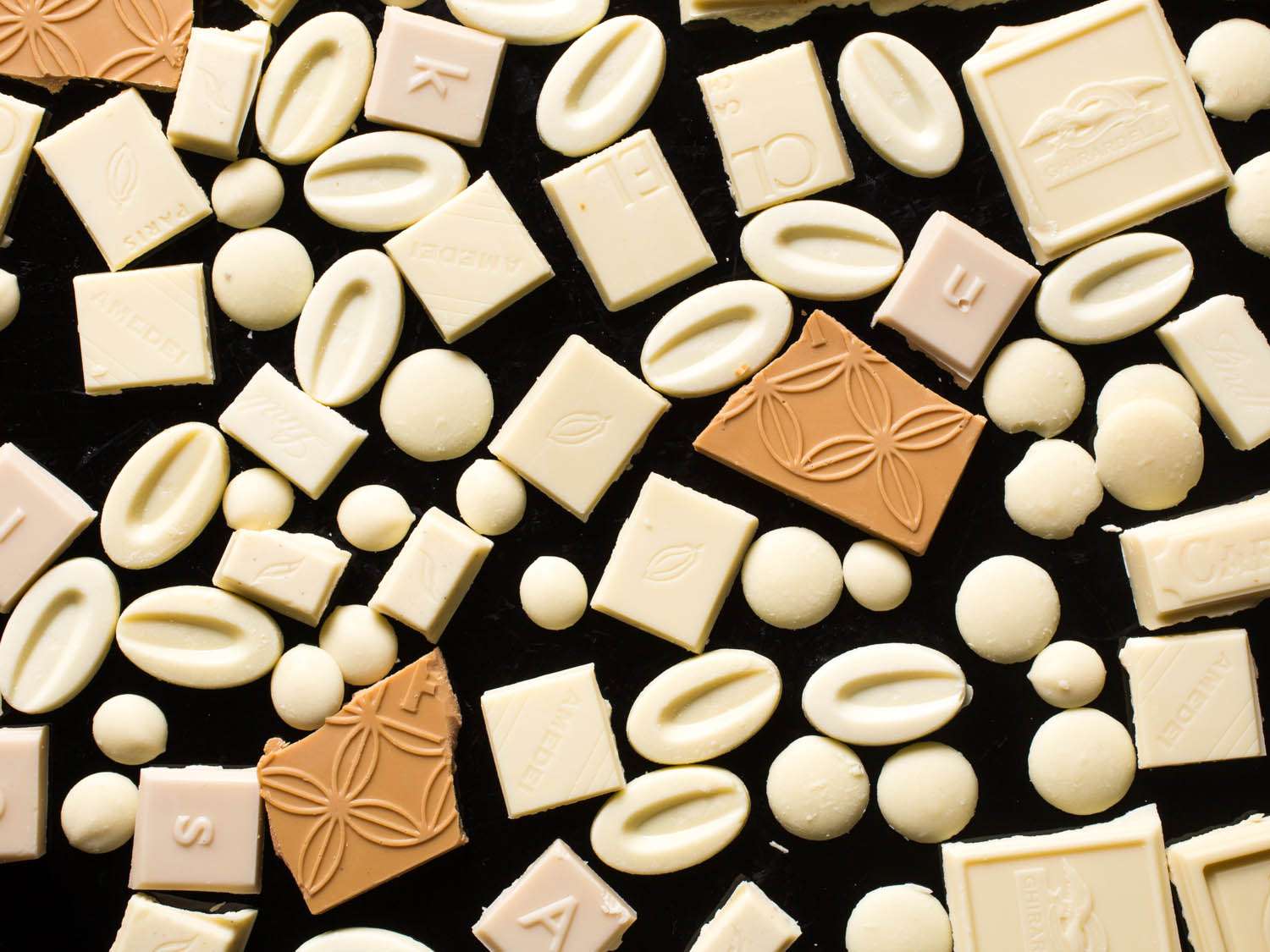 Collage of white chocolate pieces 