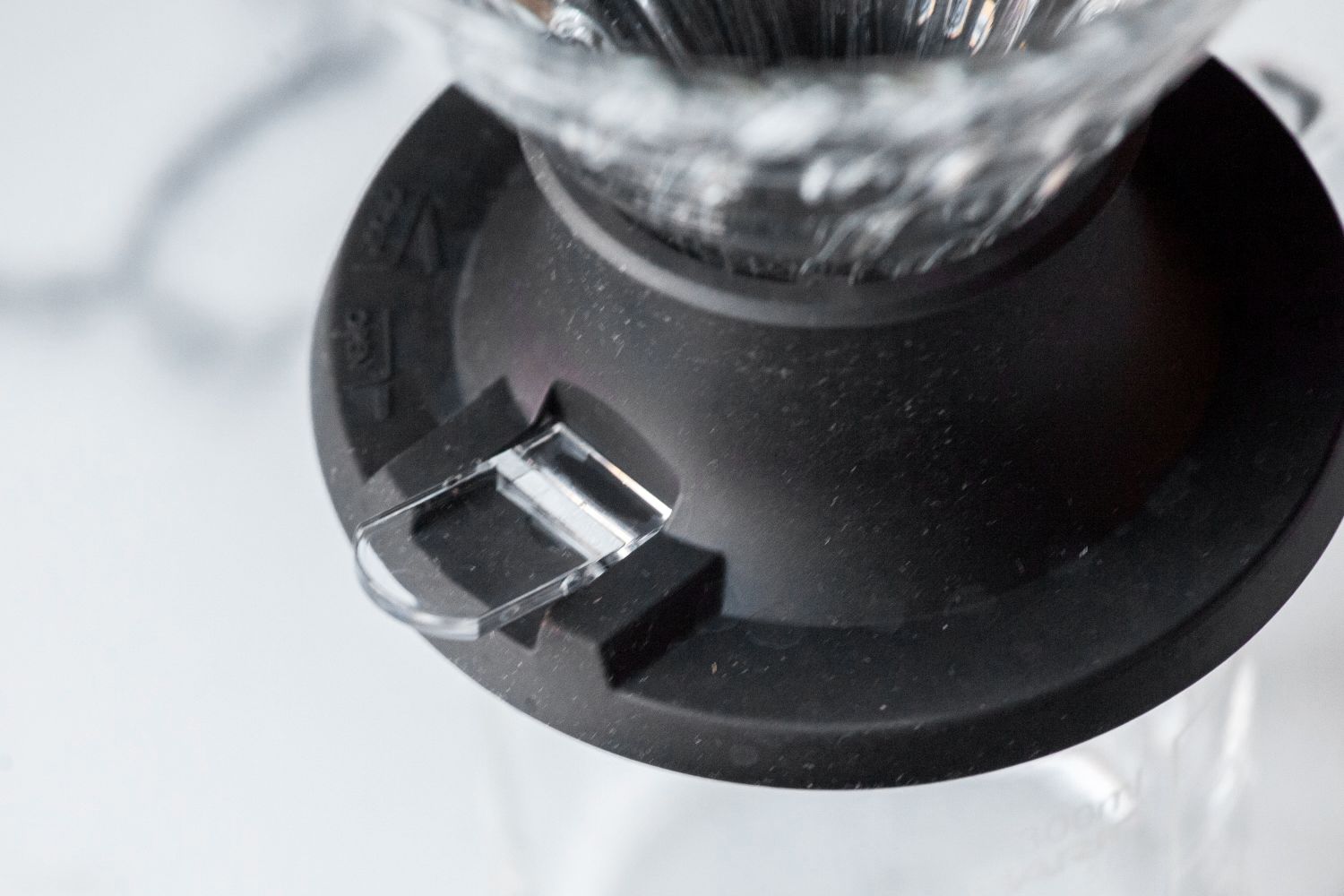 A closeup of the switch on the Hario Switch pour-over dripper