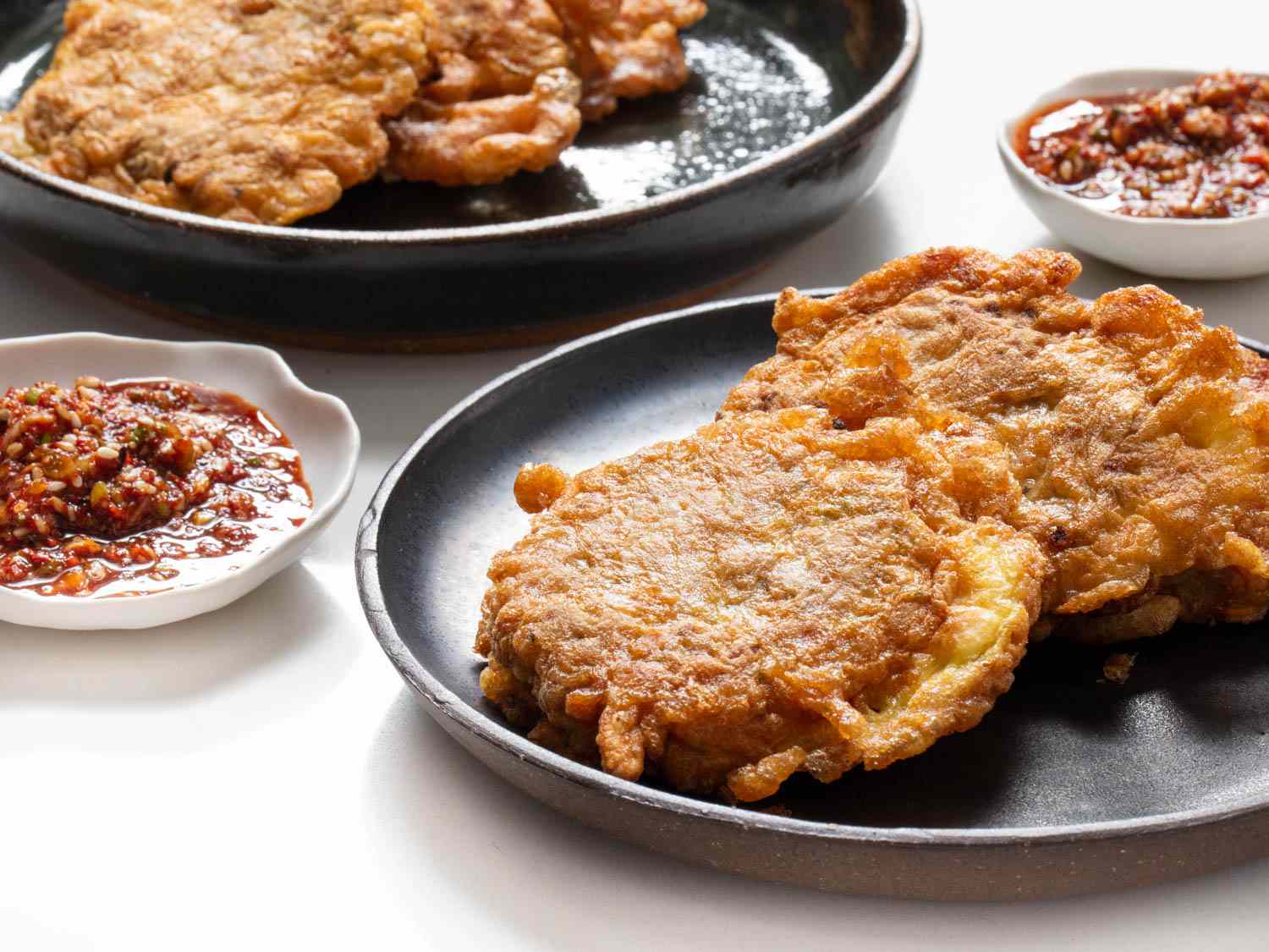 Korean jeon pancakes made with sweet potato and sausage. 
