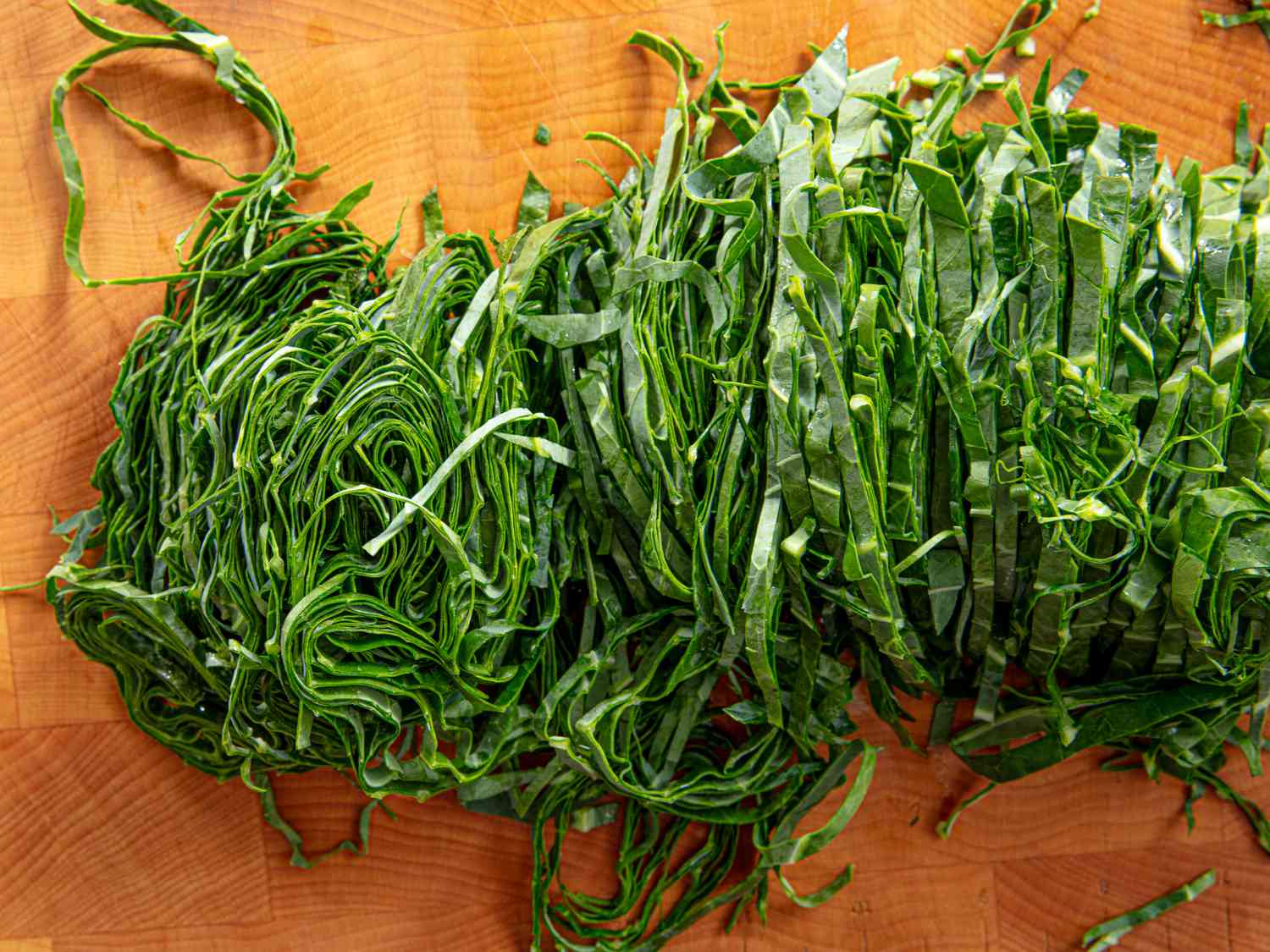 Overehead view of collard greens cut into strips