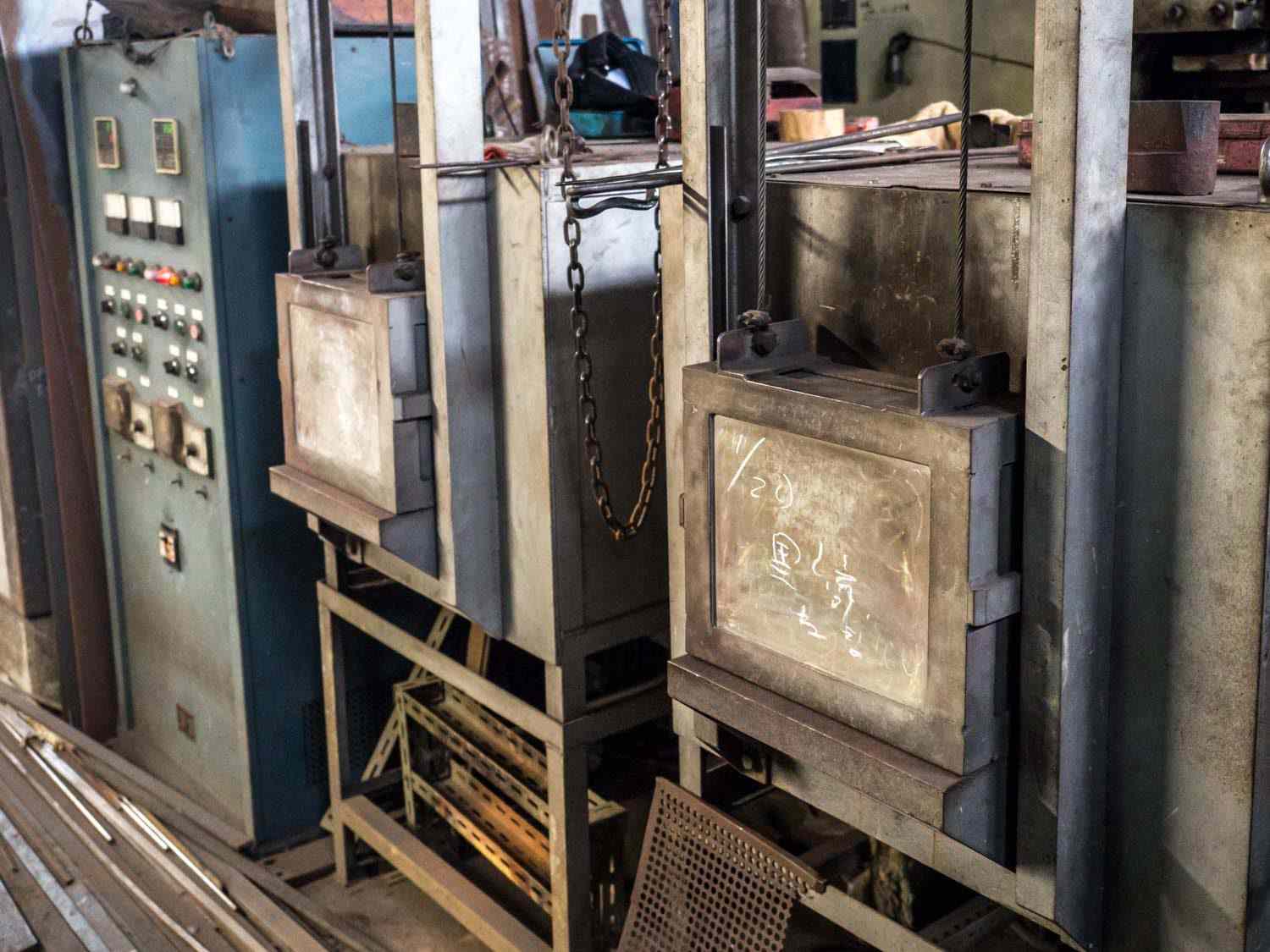 Two kilns where knife blades are heated to achieve optimal hardness.