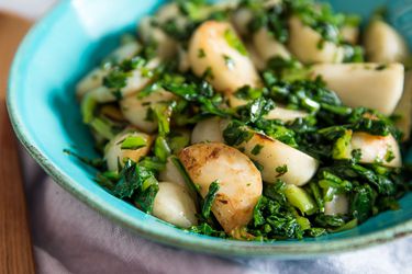 Bowl of sautéed Japanese turnips and greens