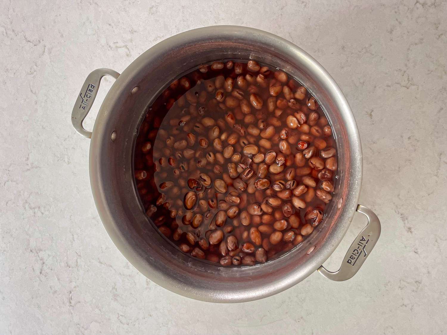 Overhead view of fava beans in pot