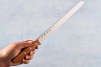 Person holding Tojiro F-737 Bread Slicer