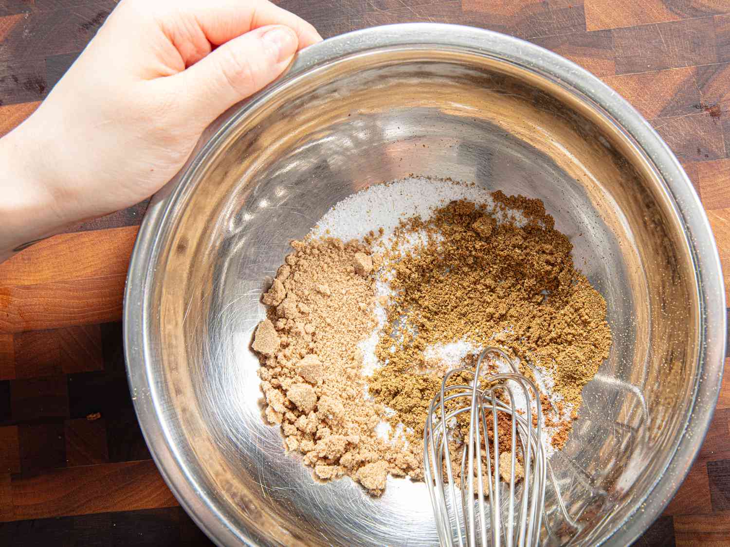 Overhead view of mixing spices together
