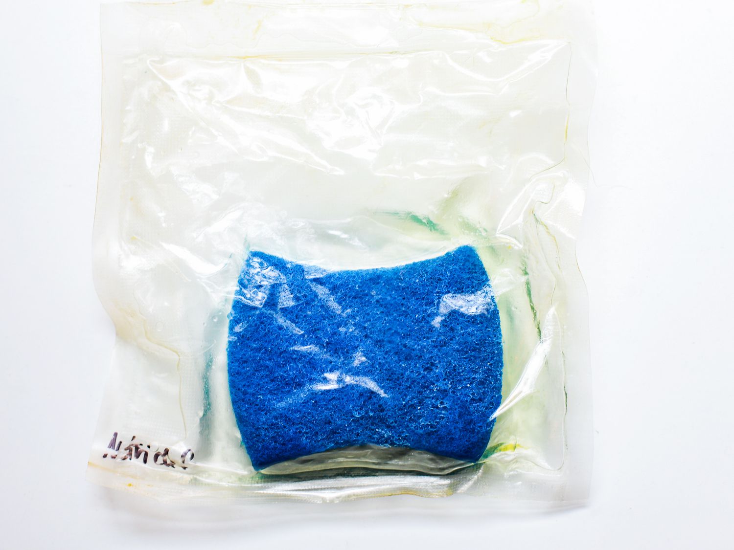 Sponge in a vacuum sealed bag whose seal has broken