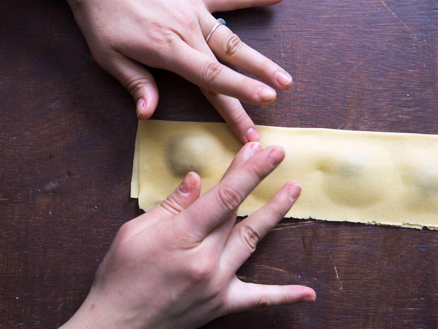 Sealing the ravioli.