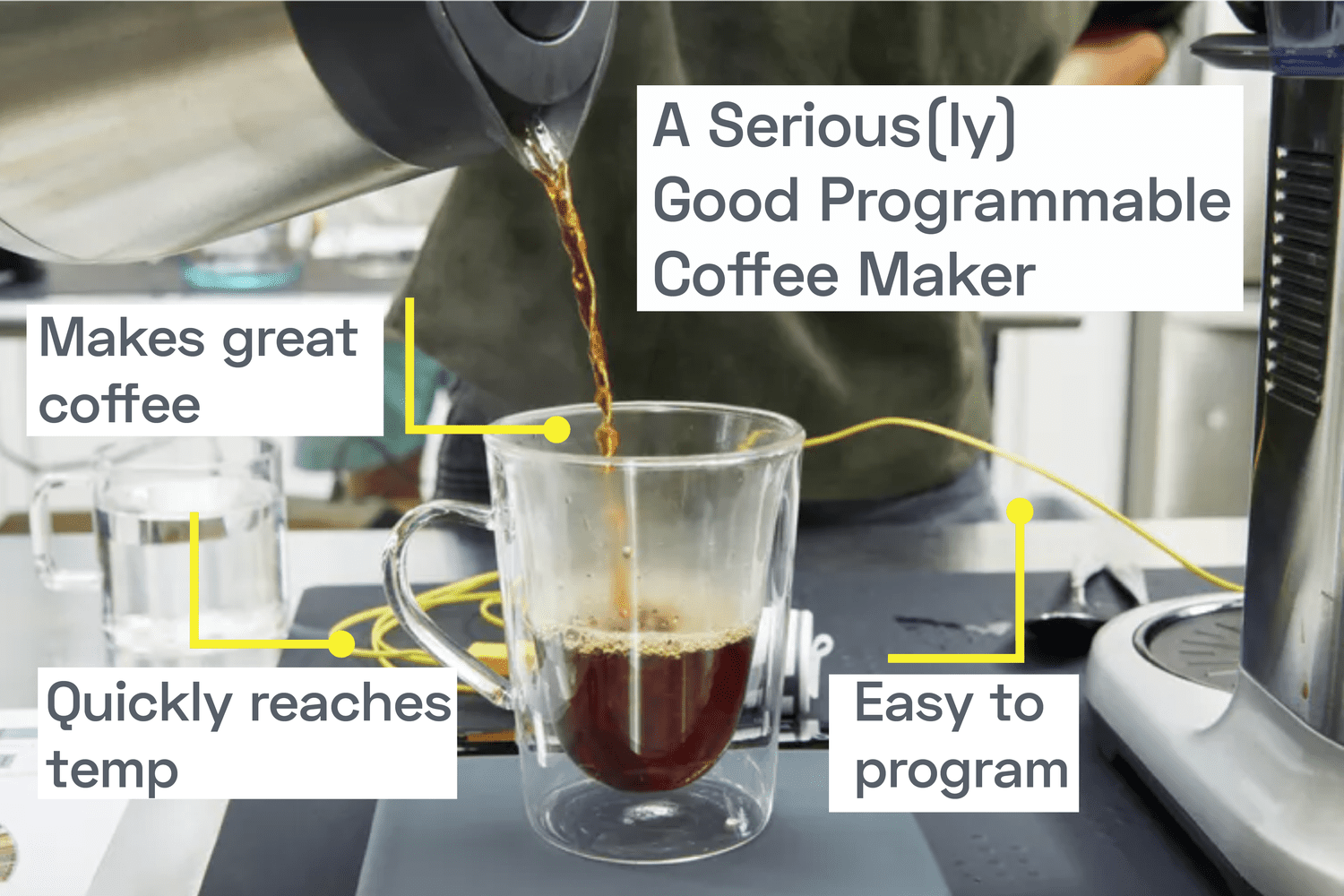 a person pouring coffee into a glass coffee mug set on a coffee scale