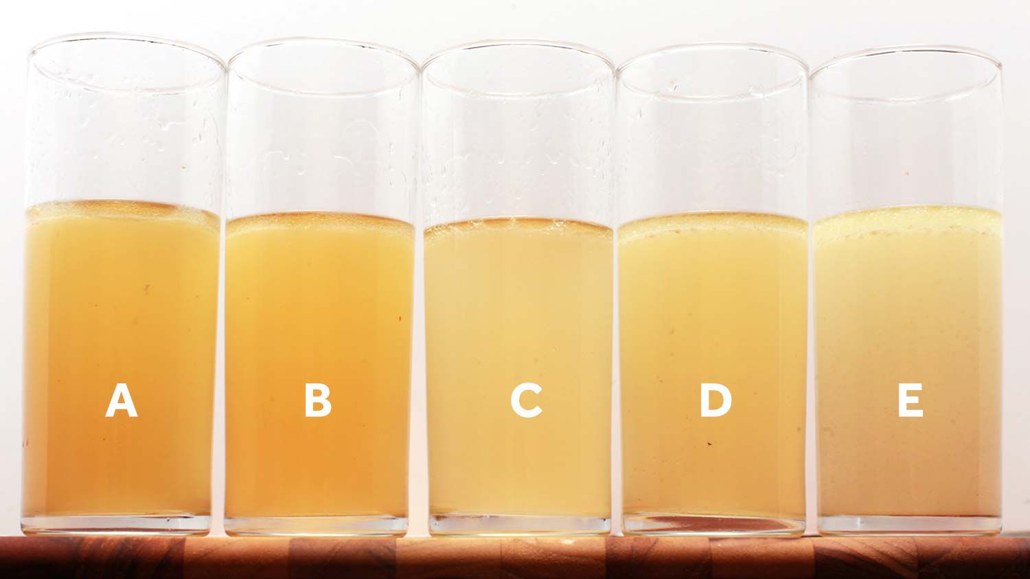 batches of chicken stock made in a pressure cooker, slow cooker and dutch oven