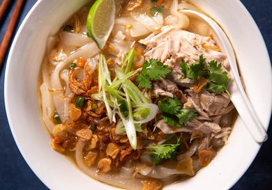 Bowl of khao piak sen (Lao chicken noodle soup)